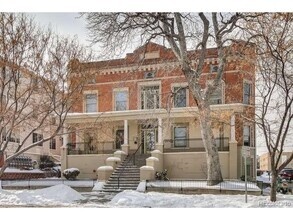 Building Photo - Large windows and exposed brick wall