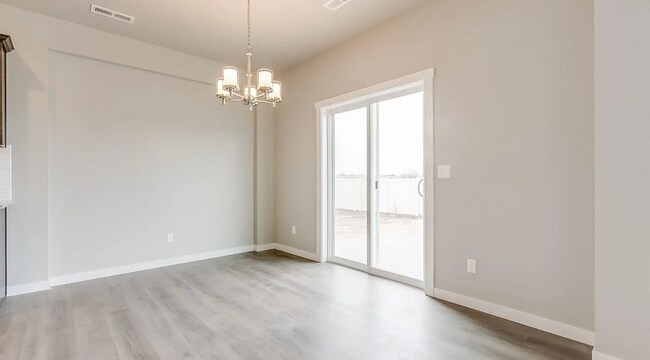 Building Photo - Modern 4-Bedroom Home in Meridian – Spacio...