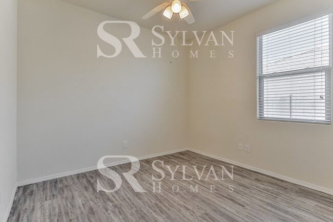 Building Photo - This charming home is ready for your personal touch!