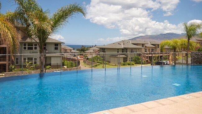 Building Photo - Gorgeous like new Premier condo in S. Kihe...