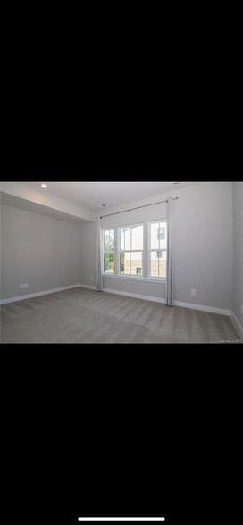 Primary Bed w/ Bath & Walk-in Closet - 458 W Tremont Ave