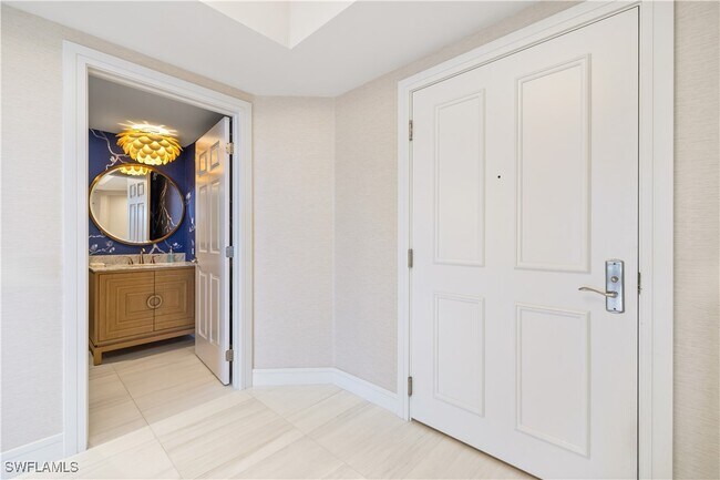 Building Photo - 7575 Pelican Bay Blvd