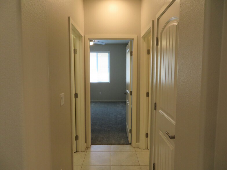 Hallway to laundry & 2nd bedroom - 1301 Catalina Rdg