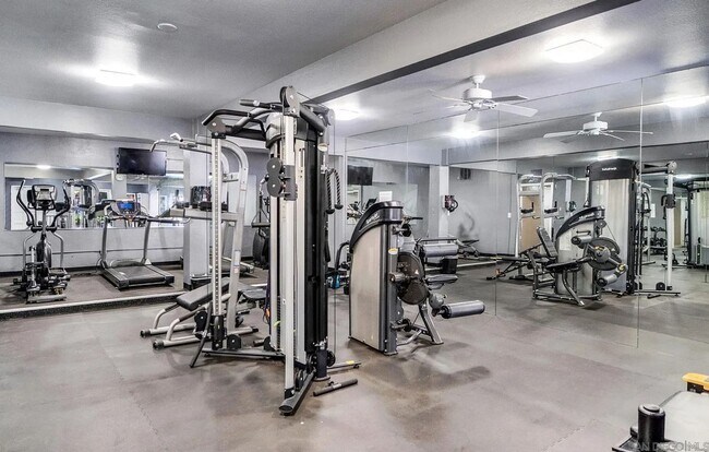 Building Photo - Spacious 1BD/1BA Mission Plaza Condo with Resort-Style Amenities in Prime Mission Valley Location