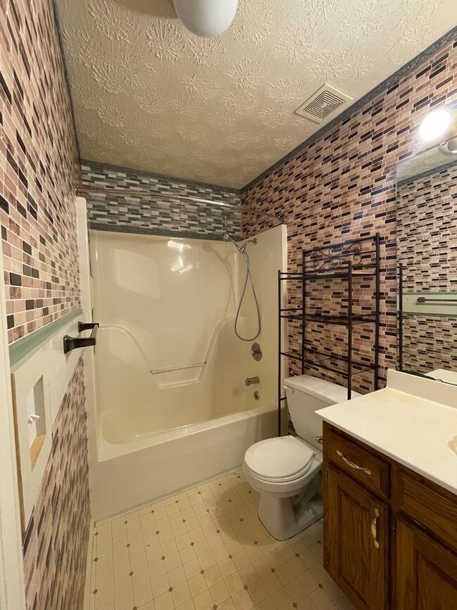 Building Photo - Excellent location - Wonderful all brick contemporary ranch styled home