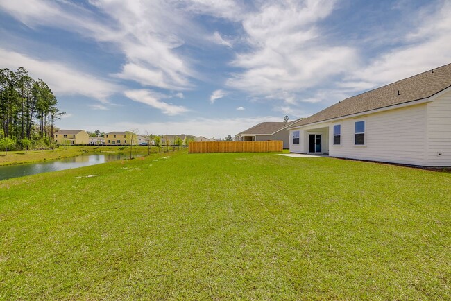 Building Photo - Beautiful 4BR Home in Woodland Trail – Top...