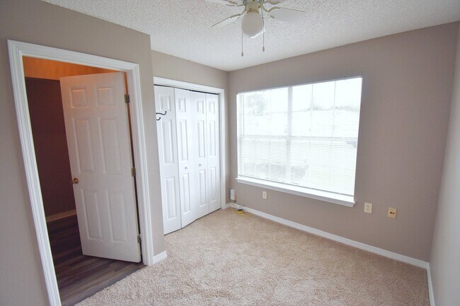 Building Photo - 2BR Patio Home with Open Layout, LVP Flooring, Private Fenced Yard, HOA Lawn Care & Convenient Bl...