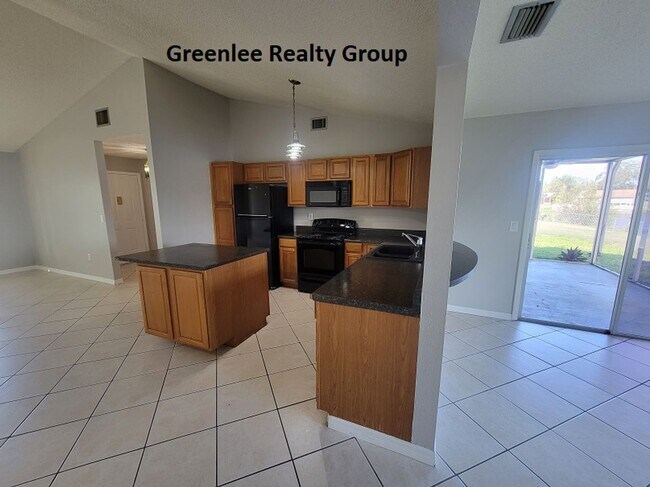 Building Photo - Relax by the water in this spacious 2-bedroom home with a 2-car garage, nestled in the highly des...