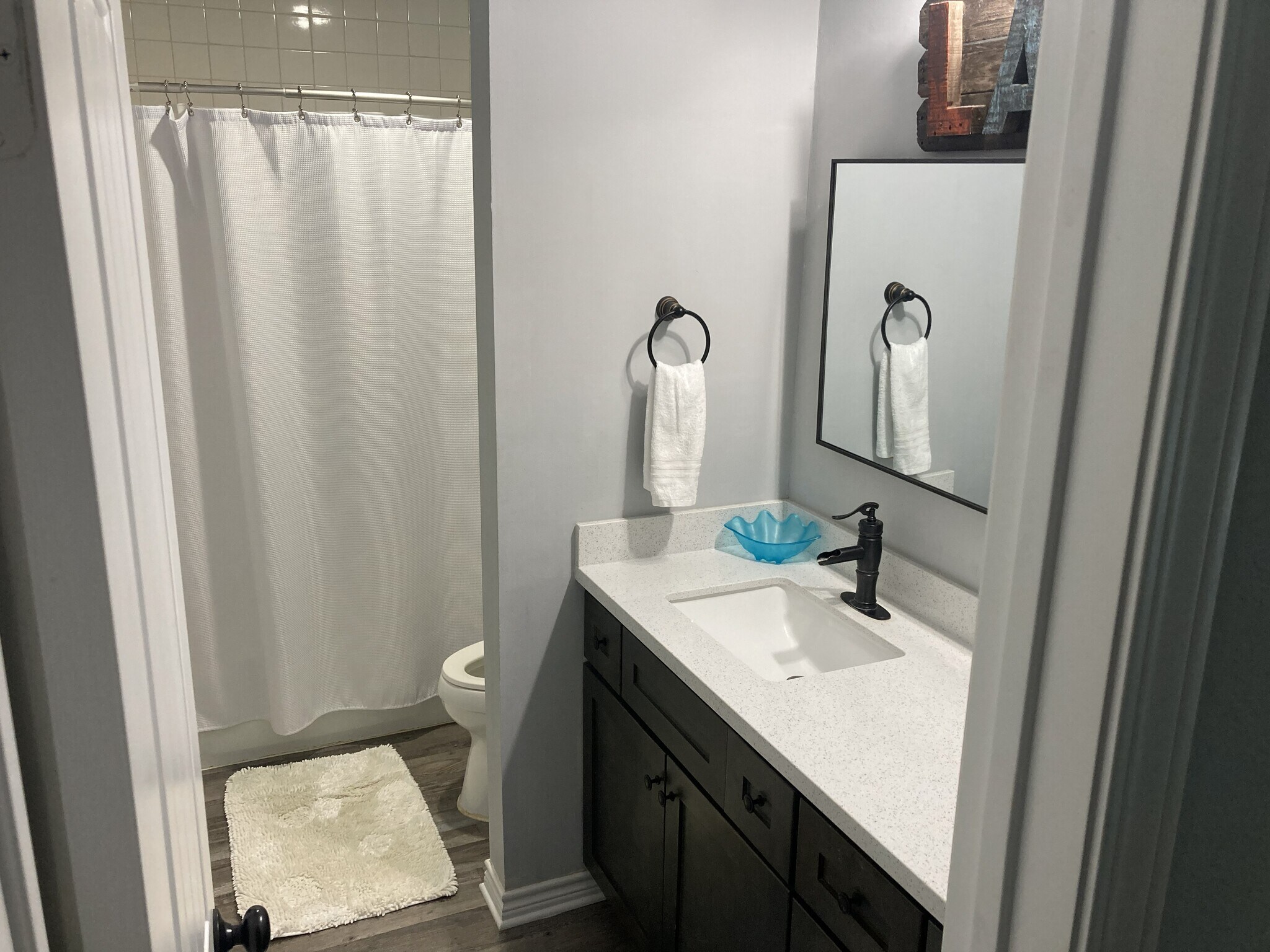 Hall Bathroom - 12500 Melville Dr