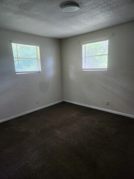 Building Photo - 6945 Woodley Dr