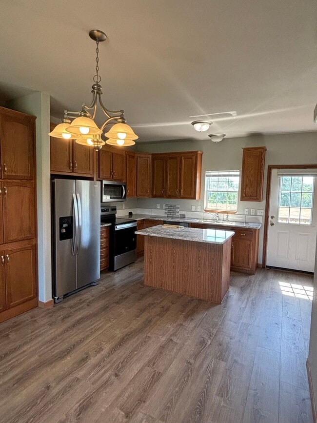 Building Photo - Fully Remodeled 3 Bedroom | 2.5 Bath Townhome – Great Location off K-18!