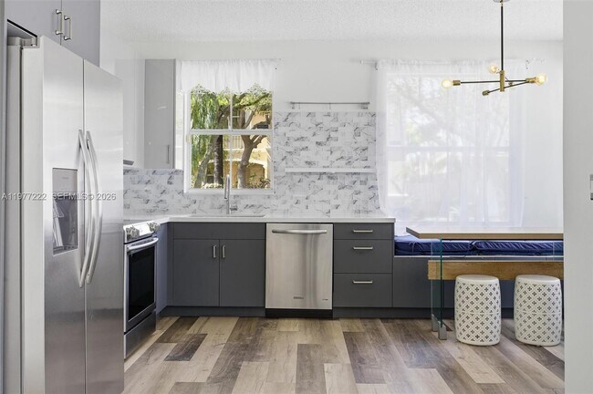 Building Photo - Seagrape Way, Hollywood, FL 33019 - 2 BR 2 BA townhouse