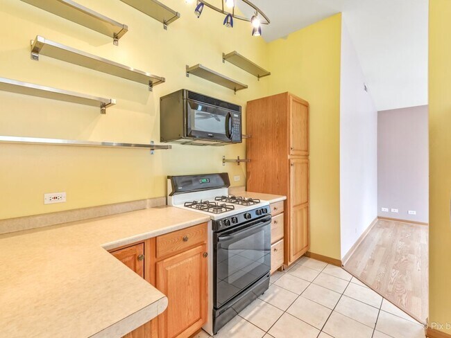 Building Photo - 4909 Spencer Ave