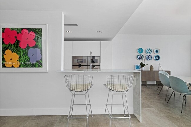 Building Photo - 10203 Collins Ave