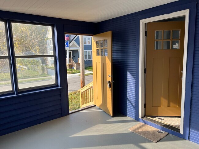 Enjoy your coffee on the enclosed Sun Room - 1483 E 112th St