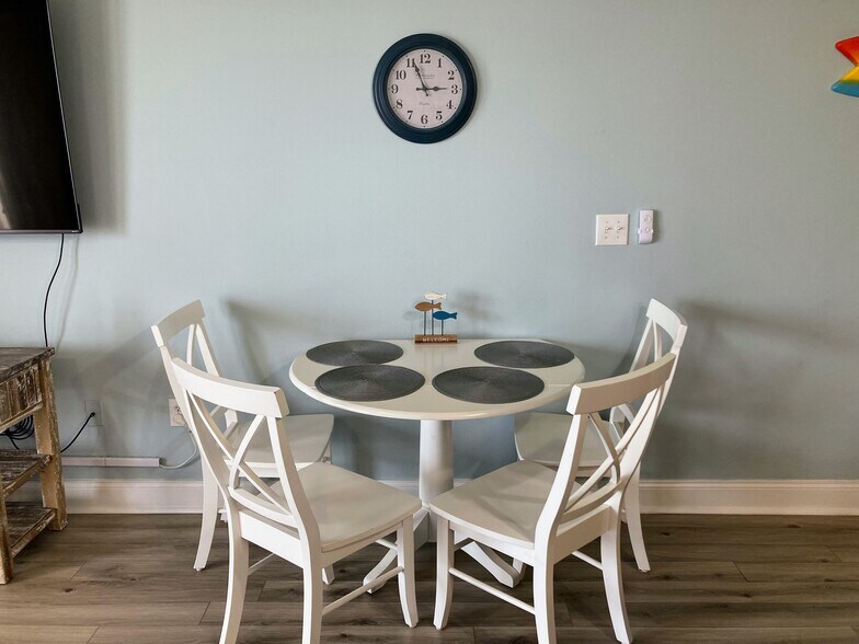 Dining table seats 4 - 9860 S Thomas Dr