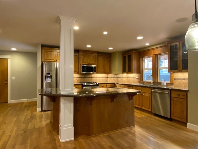 Building Photo - Northwest Crossing Gem! Bonus Office and Family Room