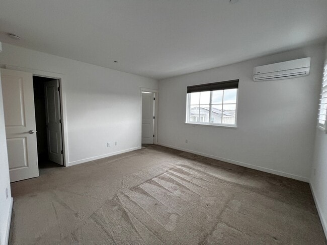 Building Photo - Updated 3rd-Floor Brody Ranch Home with Garage