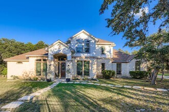 Building Photo - Large 4 bedroom home on 1 acre with lawn c...