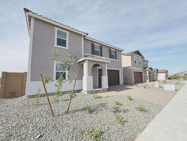 Building Photo - MOVE IN SPECIALS!! 15 DAYS RENT FREE!! New 5-Bedroom Home in Phoenix with Upgrades!