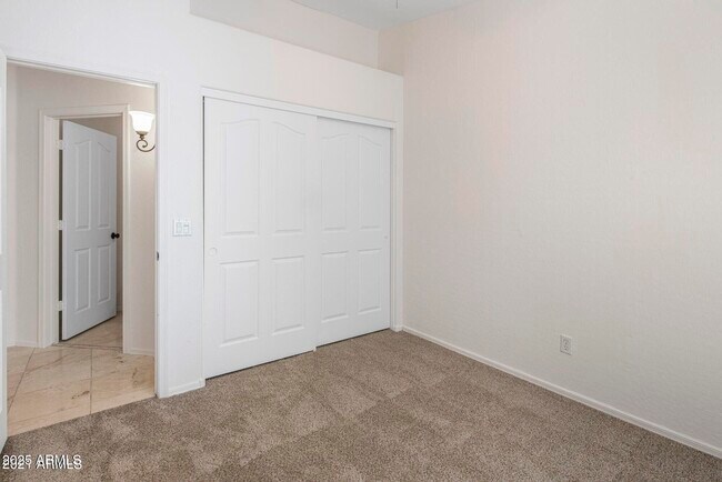 Building Photo - 10307 E Caribbean Ln