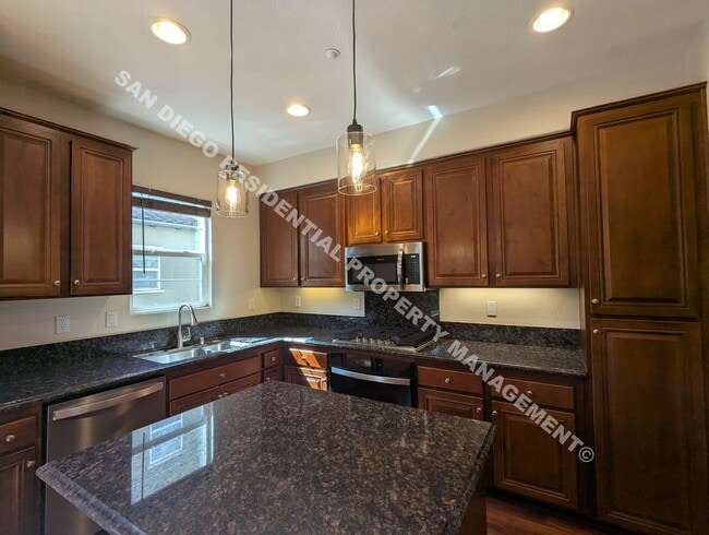 Building Photo - Beautiful San Moritz Townhome - Available ...