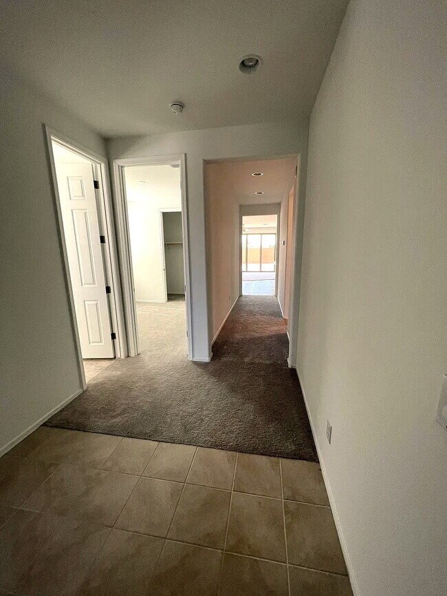 Building Photo - 4 BEDROOM RENTAL WITH 3 CAR GARAGE IN LOS PORTALES CASA GRANDE ARIZONA
