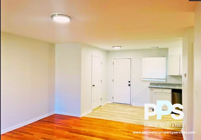 Building Photo - 6127-6129 E Fayetteville Dr