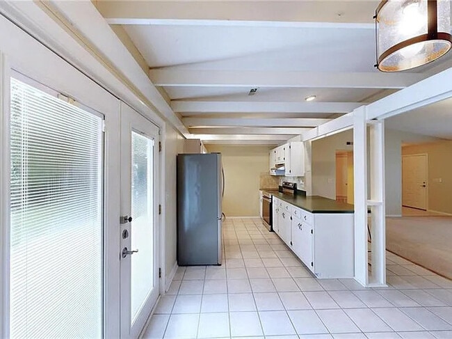 Building Photo - Earn Wealth While Leasing - Like a Homeown...