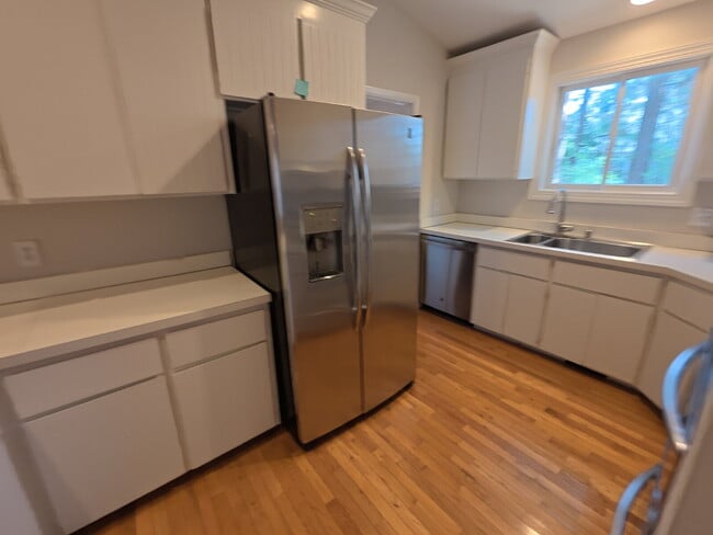 Building Photo - Terrific Rancher with Vaulted Ceiling in Meredith Woods.