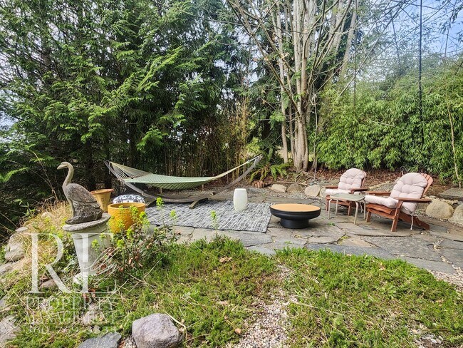 Building Photo - Light-Filled View Home with Vaulted Ceilings & Warm Wood Finishes