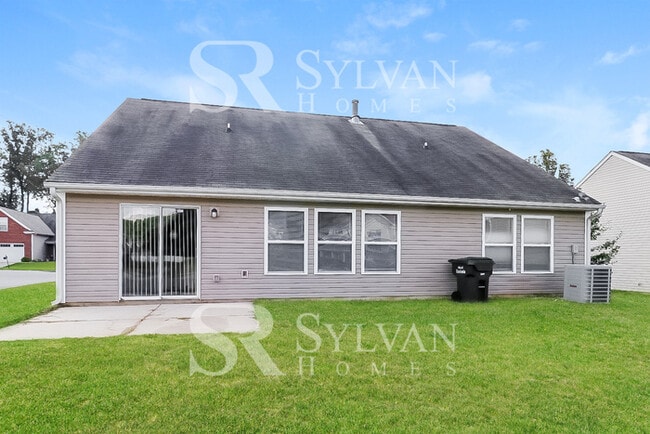 Building Photo - This adorable home is ready for your personal touch!