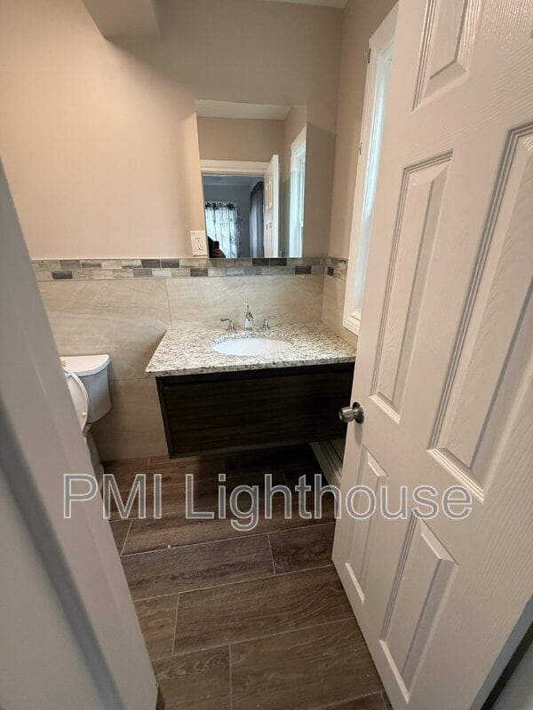 Building Photo - 115 8th Ave