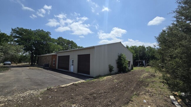 Building Photo - Spacious Ranch Style 5-Bedroom Home with Oversized 4 Car Garage / Workshop, 4 RV Carport & 1 Acre...