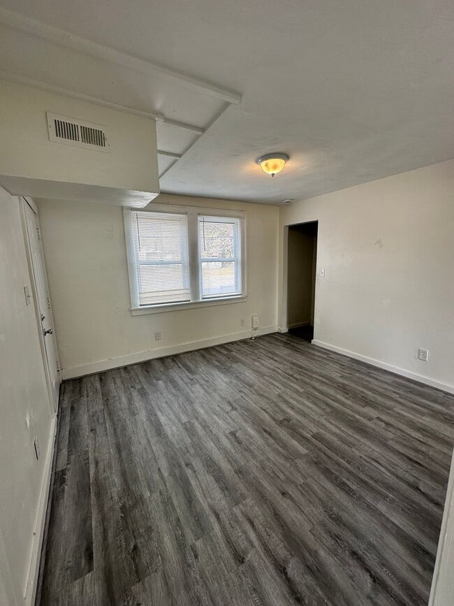 Building Photo - Three Bedroom Available Soon!