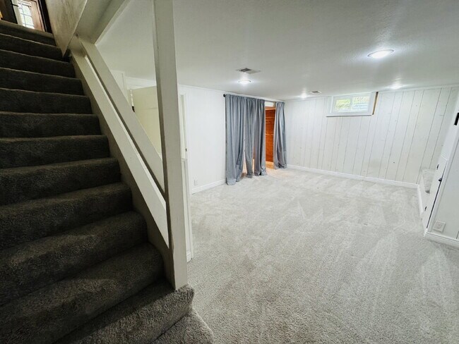Building Photo - Charming 3-Bedroom Oasis with Elegant Touches & Finished Basement on Washburn Ave!