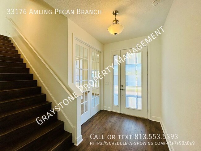 Building Photo - "Luxury Living in Wesley Chapel: Spacious ...