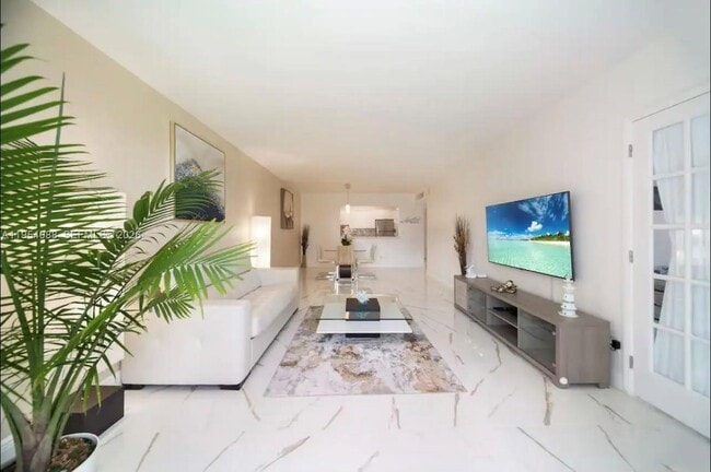 Building Photo - 19370 Collins Ave