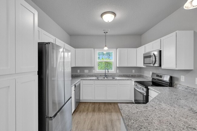 Building Photo - Modern 2-Story Townhome with Garage