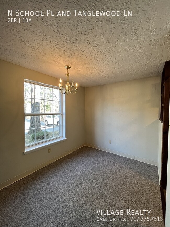 Building Photo - No Steps! Roomy 2-Bed with A/C & Off-Stree...