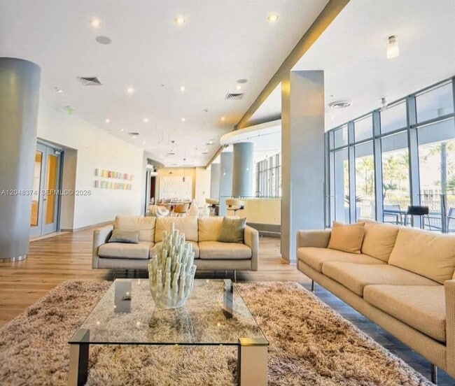 Building Photo - 10275 Collins Ave