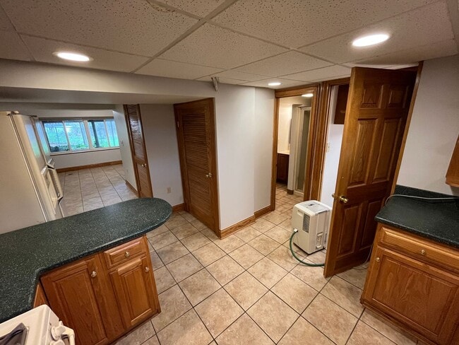 Building Photo - **RIVERFRONT 4-BEDROOM/2-BATH WITH 4-CAR GARAGE, FULL BASEMENT!!**