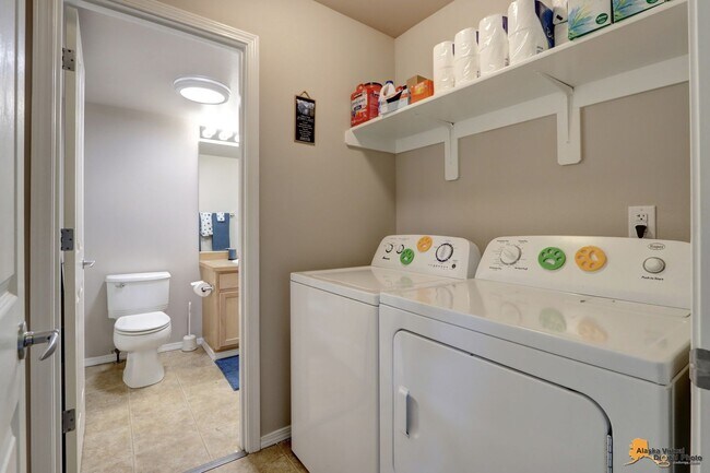 Building Photo - East Anchorage Home with Utilities Included!! Close to JBER! Attached Two Car Garage + Fenced in ...