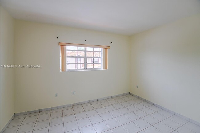 Building Photo - 6400 SW 138th Ct