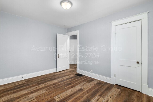 Building Photo - 8009 Monroe Ave