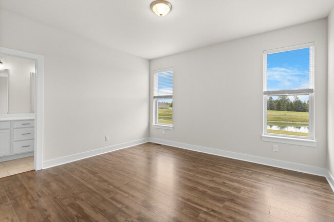 Building Photo - W218N16046 Tiger Lily Dr