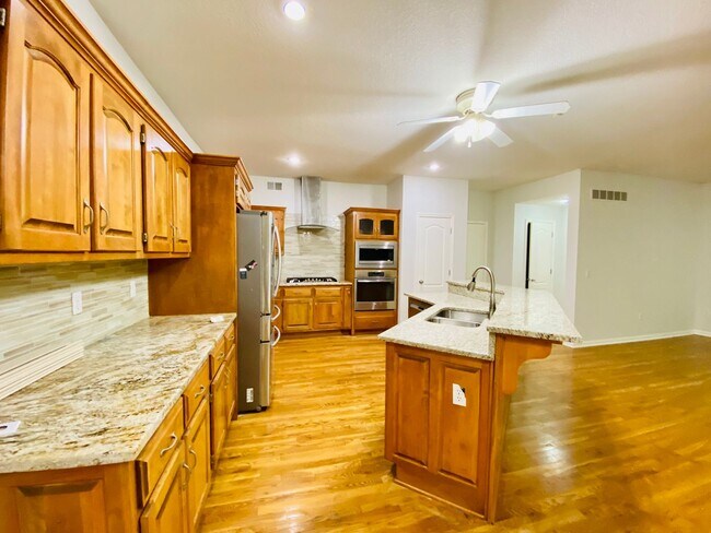 Building Photo - {15808} Hampton Place Two Story Home + Finished Basement + Three Car Garage + Blue Valley HS