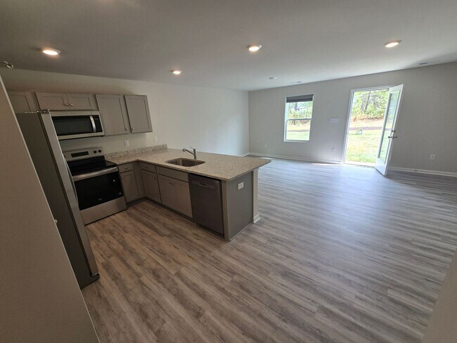 Building Photo - BRAND NEW 3 BEDROOM TOWNHOUSE IN PRINCE GEORGE
