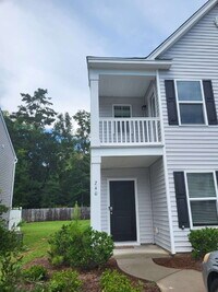 Building Photo - "Spacious Fully Furnished 4-Bedroom Townho...