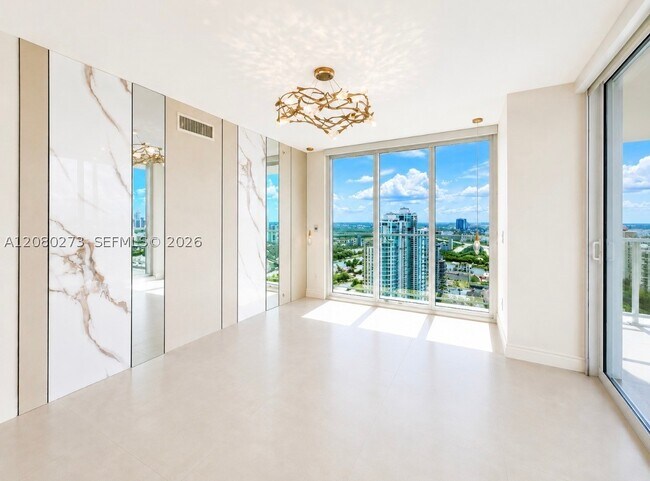 Building Photo - 16699 Collins Ave